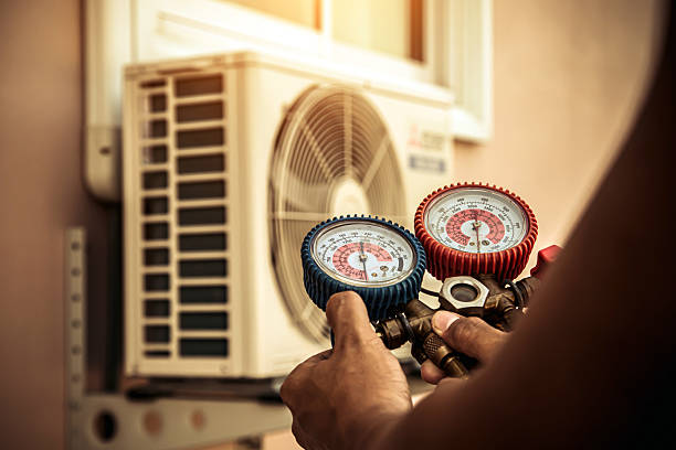Professional Heat Pump Repair technician working in Clermont, GA
